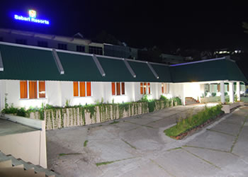 Nighttime exterior view of Sabari Resorts